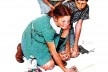 Crianças jogando bola de gude, pintura de Norman Rockwell, 1939