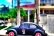 Fusca psicodélico, série fotográfica “Os fuscas ofuscam”