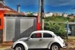 Fusca bege, série fotográfica “Os fuscas ofuscam”