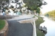 Trilha: Piso permeável para pedestres e pescadores ao longo da margem