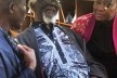 Demas Nwoko com A. Ugbodaga e o arquiteto Diébédo Francis Kéré, prêmio Pritzker 2022