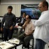 Grupo brasileiro participando de avaliação de trabalhos de alunos