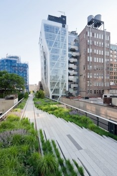 A meandering pathway passes by old and new architecture in West Chelsea, between West 24th and West 25th Streets, looking South