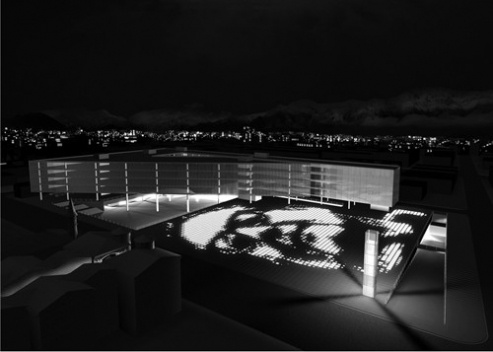 Vista externa noturna do conjunto